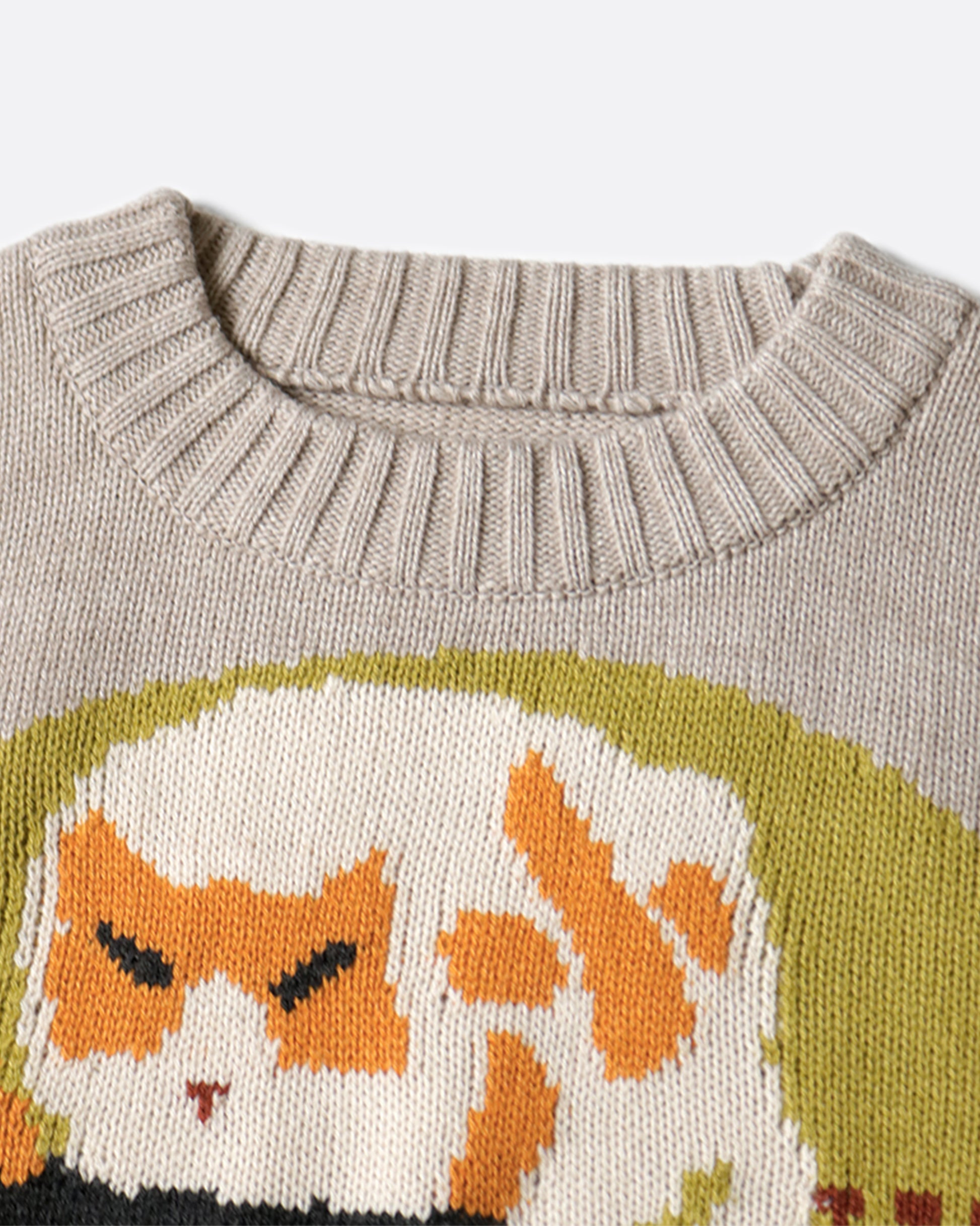 A 7g knit crewneck sweater with a design inspired by the Woodstock logo of 1969.