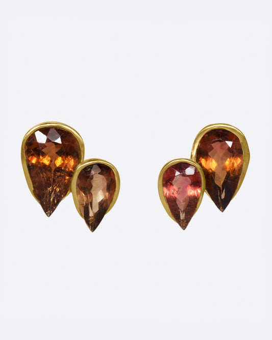 These earrings both look like flames and are the colors of dark embers, but what makes them really special is their modified bezel settings.