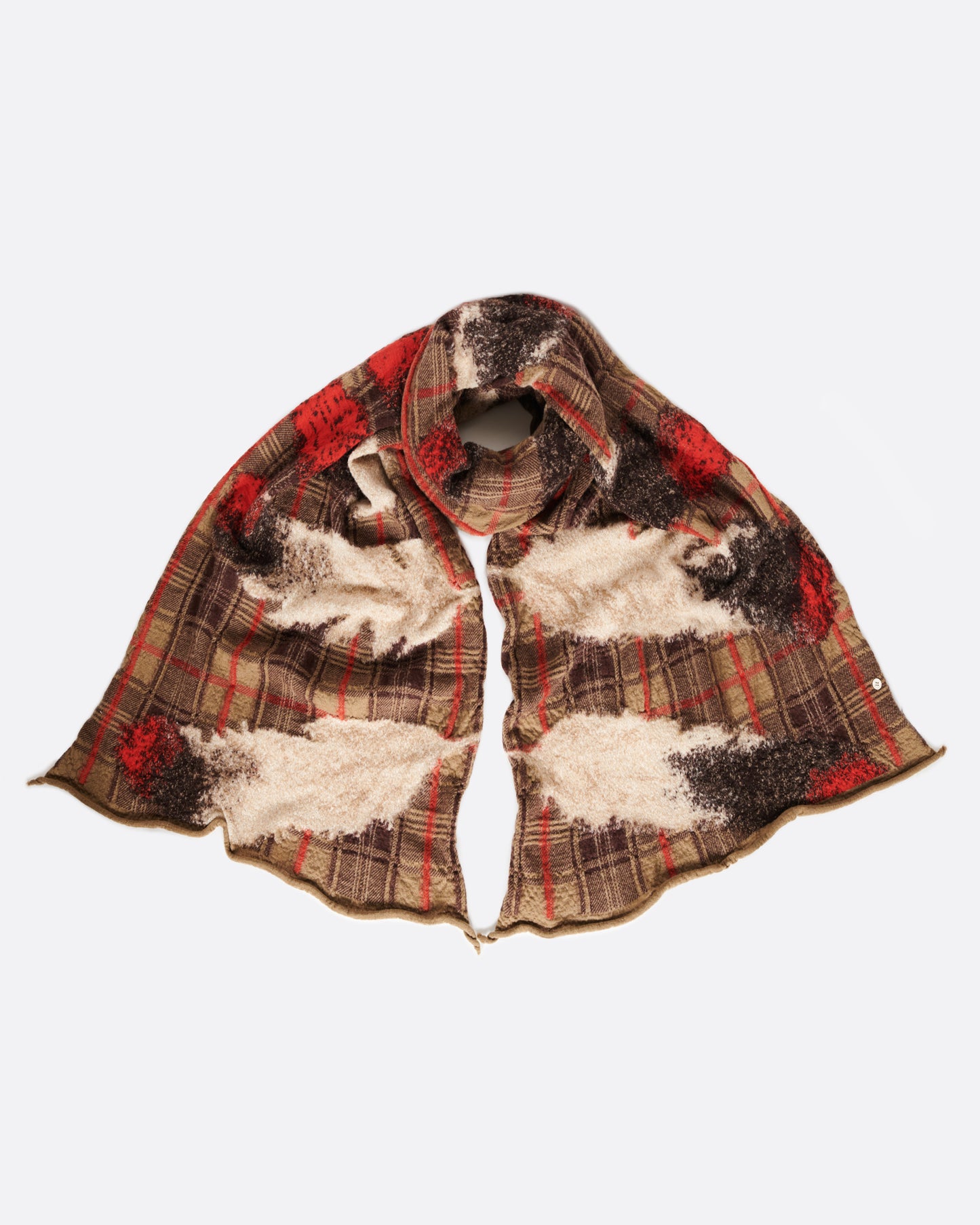 This scarf combines traditional Scottish tartan with long, majestic feathers.