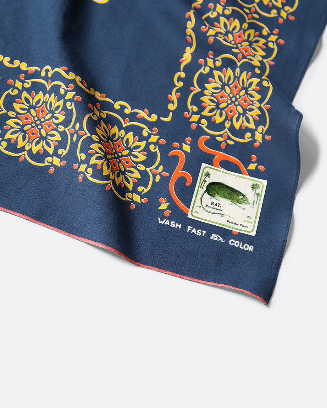 A navy bandana with naja motif.