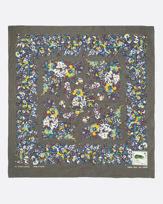 A deep khaki bandana with floral motif.