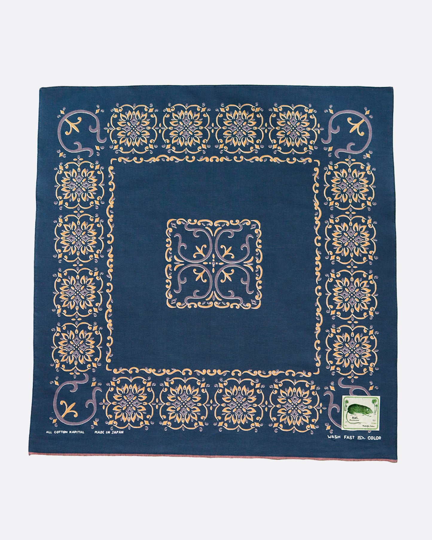 A fastcolor selvedge bandana with a nod to Native American jewelry, more specifically the Naja and its connection to mother earth.