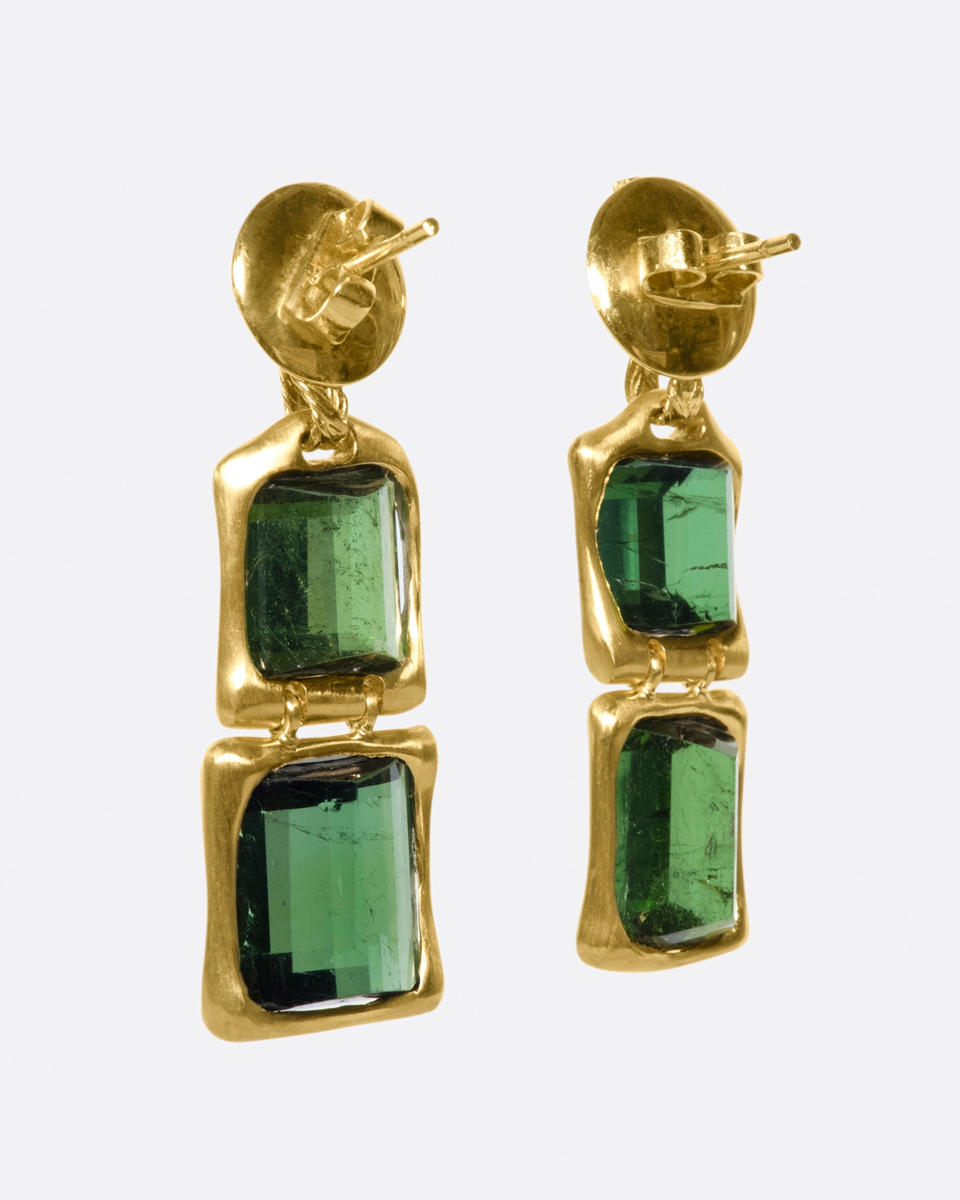 These deep green earrings are hinged between the two tourmalines, giving them some great movement and swing.