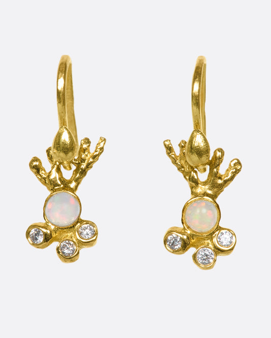 These 18k gold drops with opals and diamond details look like coral glimmering in sunlit water as they swing under your ear.