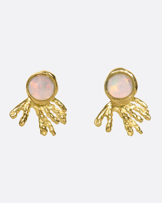 These 18k gold and translucent opal studs look like pink, orange, and blue comets flashing across your ears.