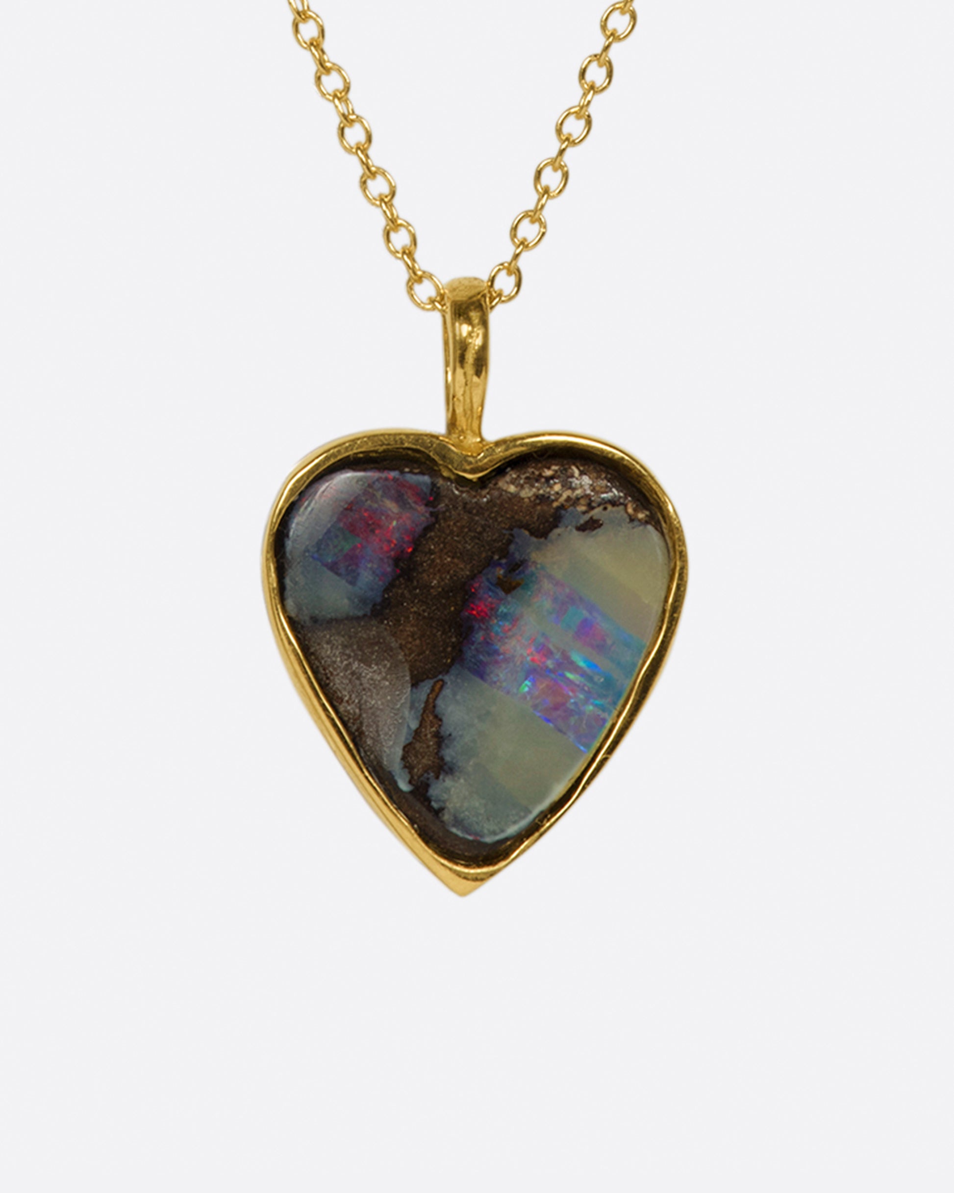 A heart shaped Australian opal pendant with loads of flash.