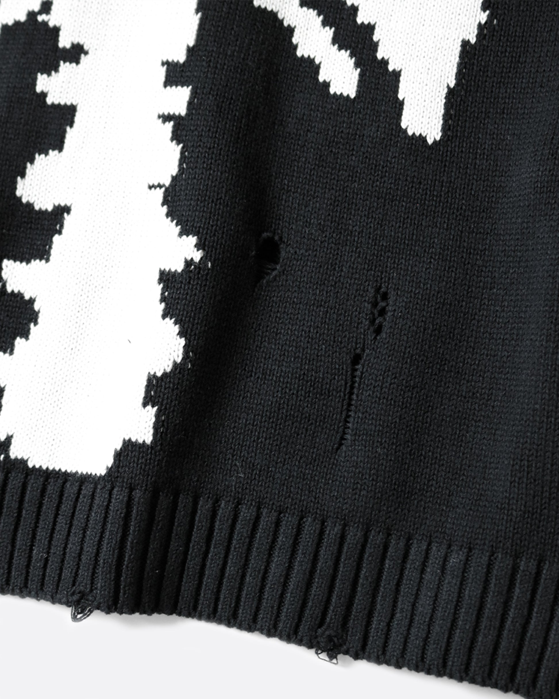 A distressed, black crewneck sweater with Kapital's beloved bone design on the back and sleeves.