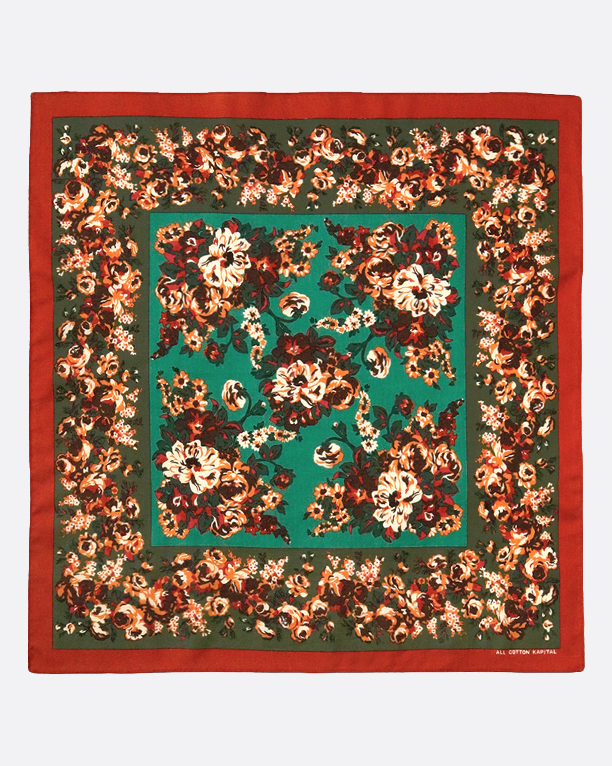 A cotton color bandana with a multicolor floral champetre design that looks like picked dianthus flowers, tied together.