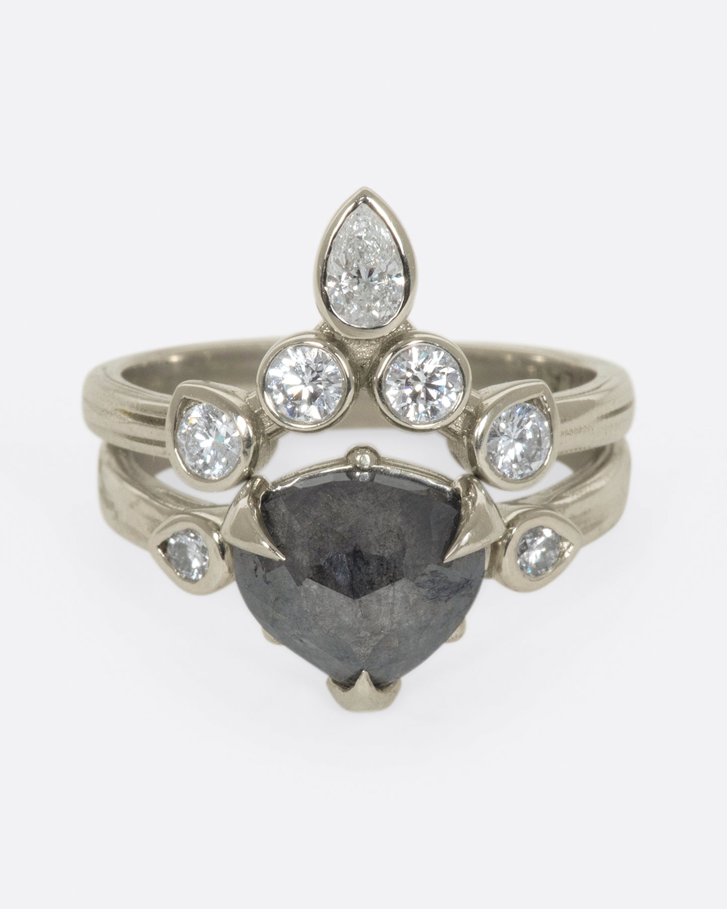 This crowning design can be worn in either direction on the finger, alone, or stacked with another one of Karen's creations - We love it with one of her Invincible Heart rings