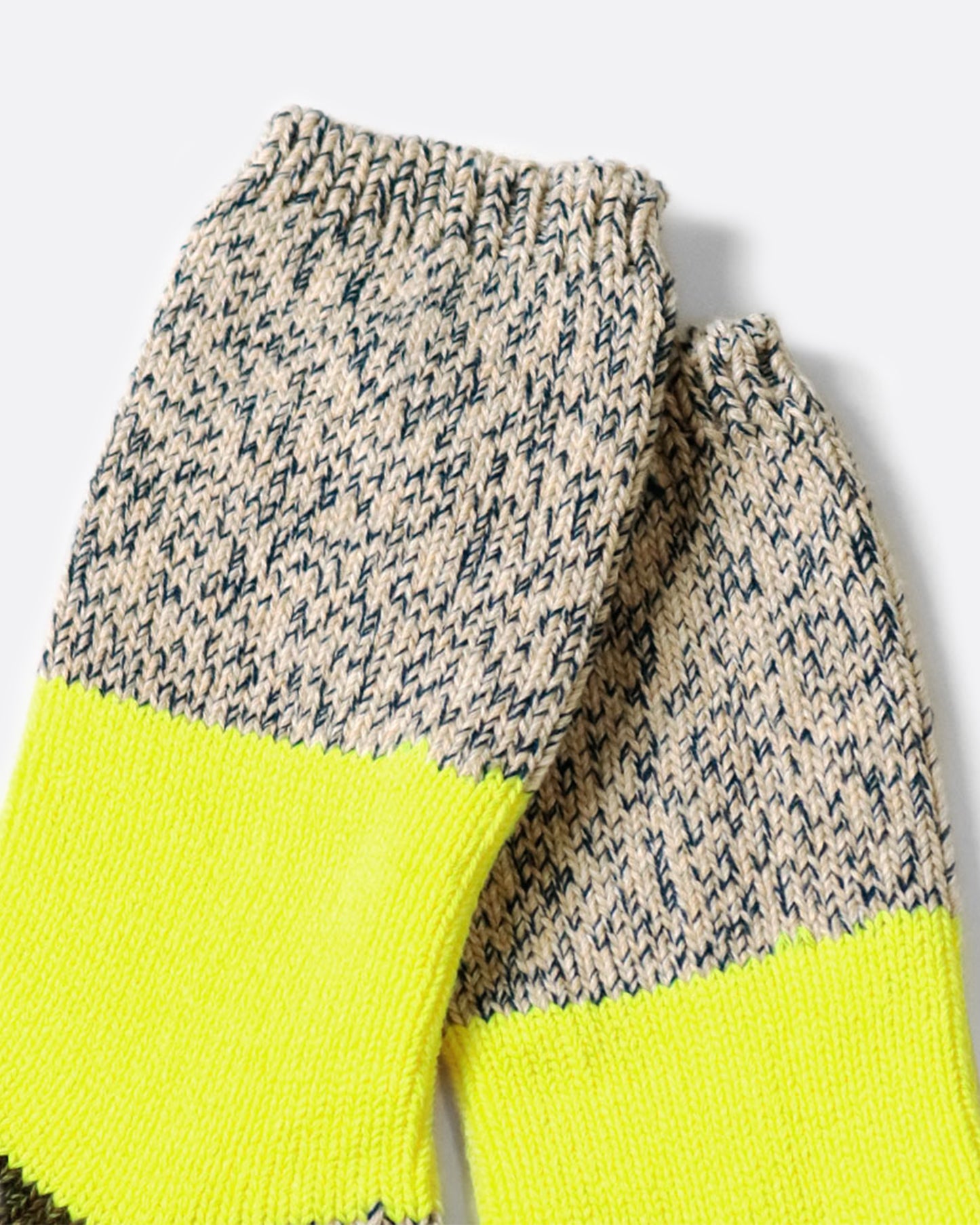 These thick heather gray socks are rich and fluffy with wide neon yellow and olive green stripes down the center.