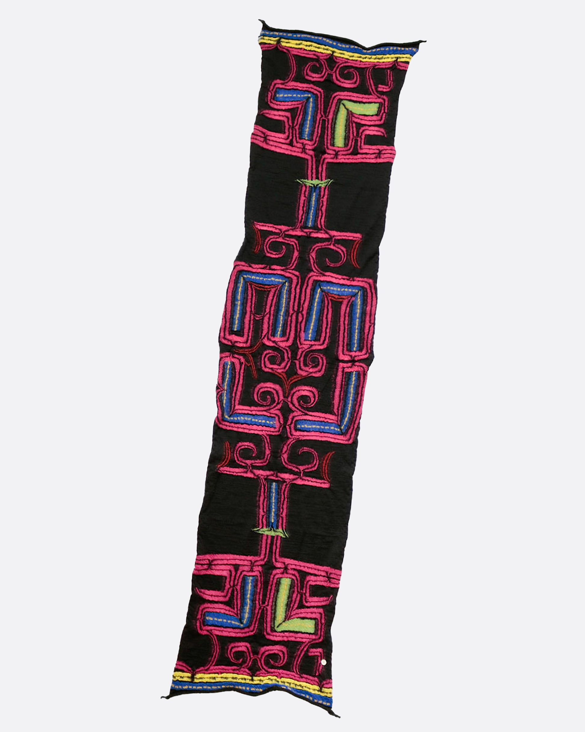 A black scarf with a neon pink Ainu pattern