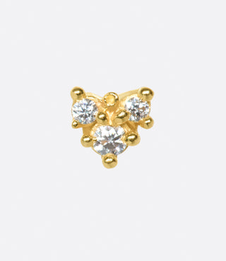 Not your average diamond earring; this piece looks great in a second or third piercing.