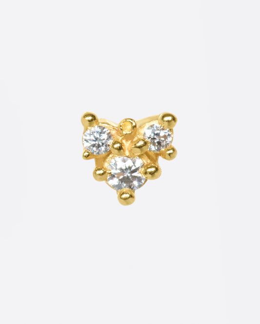 Not your average diamond earring; this piece looks great in a second or third piercing.