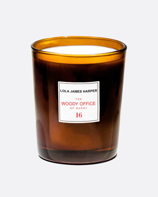 A candle whose scent is inspired a beloved home office, reminiscent of an ancient library.
