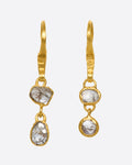 These natural grey Borneo diamond drops are wrapped around their edges in 22k gold, so you can see the unique, asymmetrical stones from both sides.