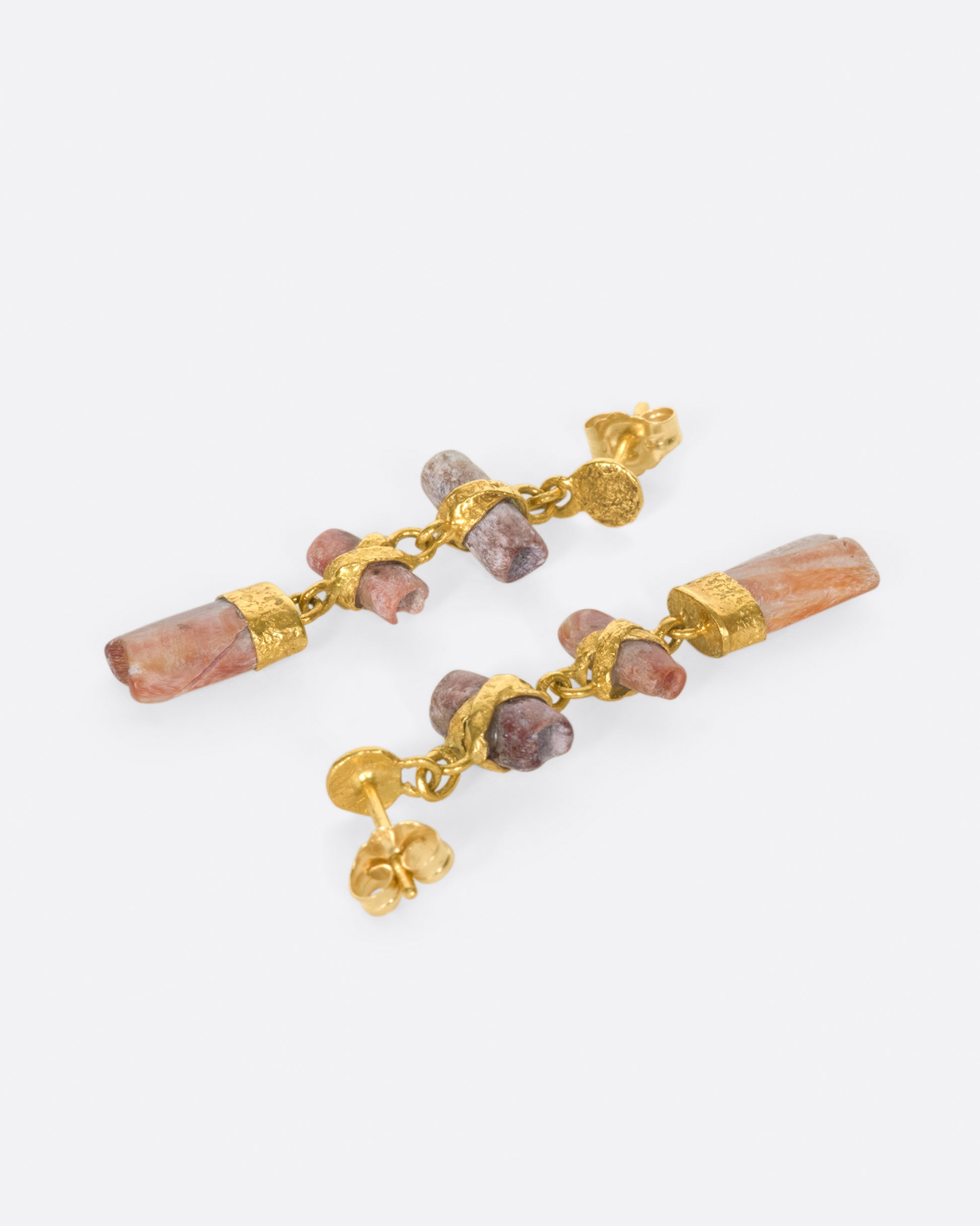 The high karat gold and peachy pink tones of these Pre-Colombian beads are a perfect match.