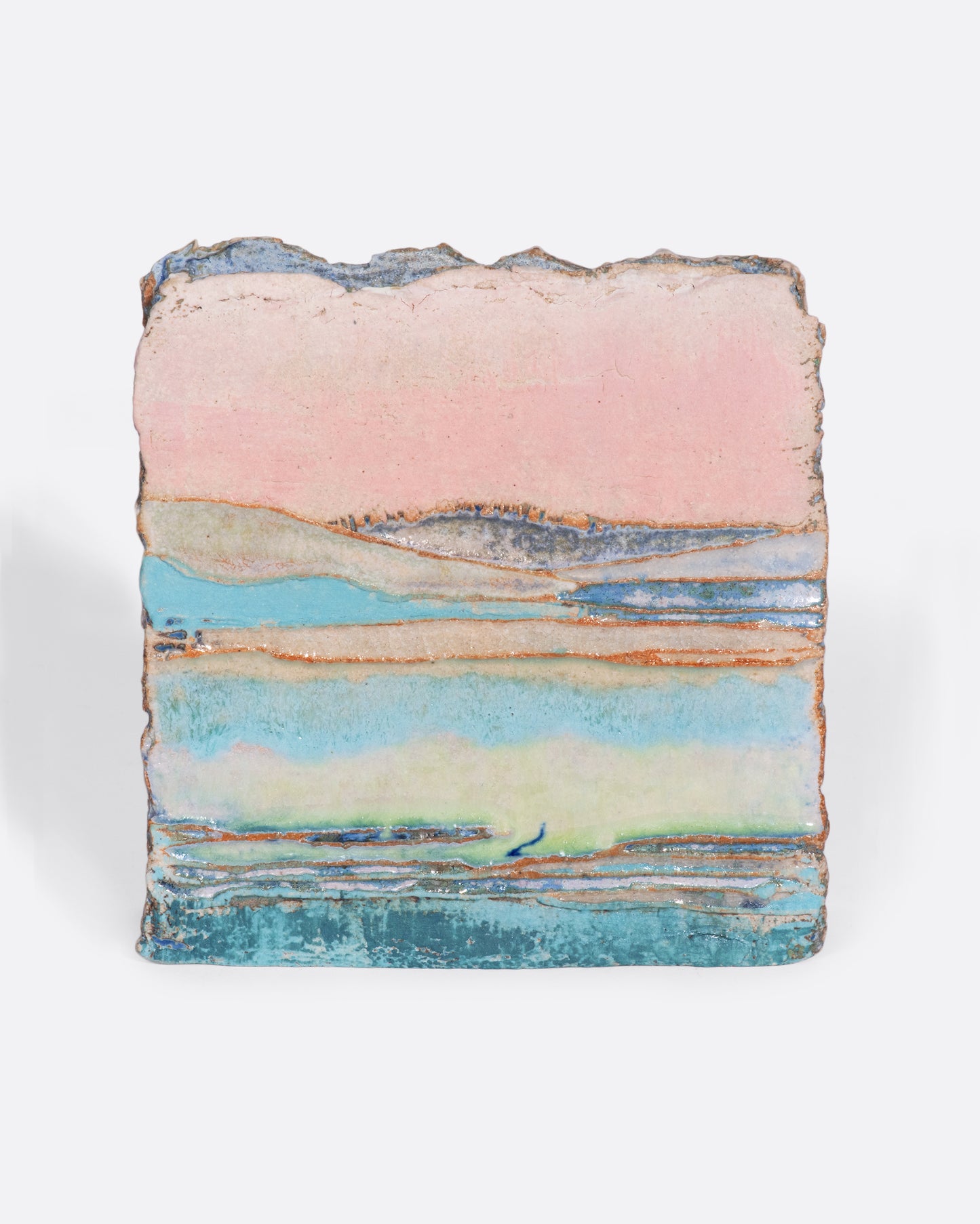 A ceramic vessel meticulously handmade with many layers of glaze atop stoneware clay. The rich, varied texture becomes a beautiful canvas for an ethereal landscape like you're gazing over a lake while the sunsets golden over hills in the distance.