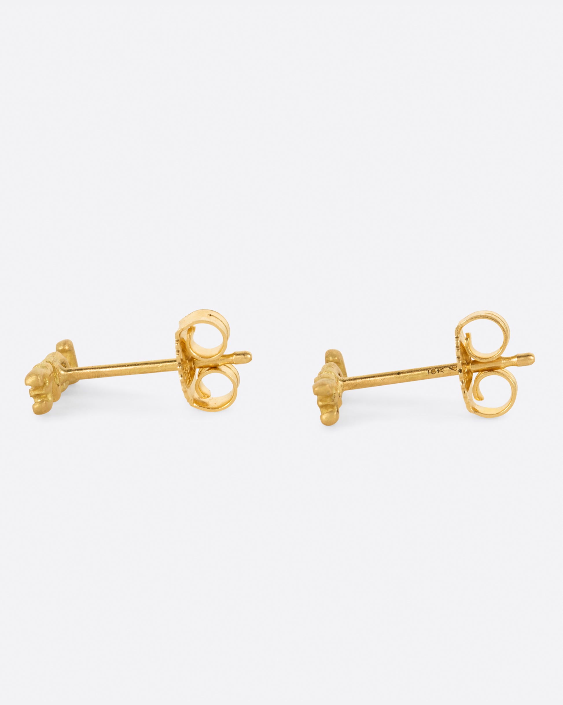 A pair of simple and sweet gold earrings. The word LOVE is spelt out, making these a great gift for your sweetheart.