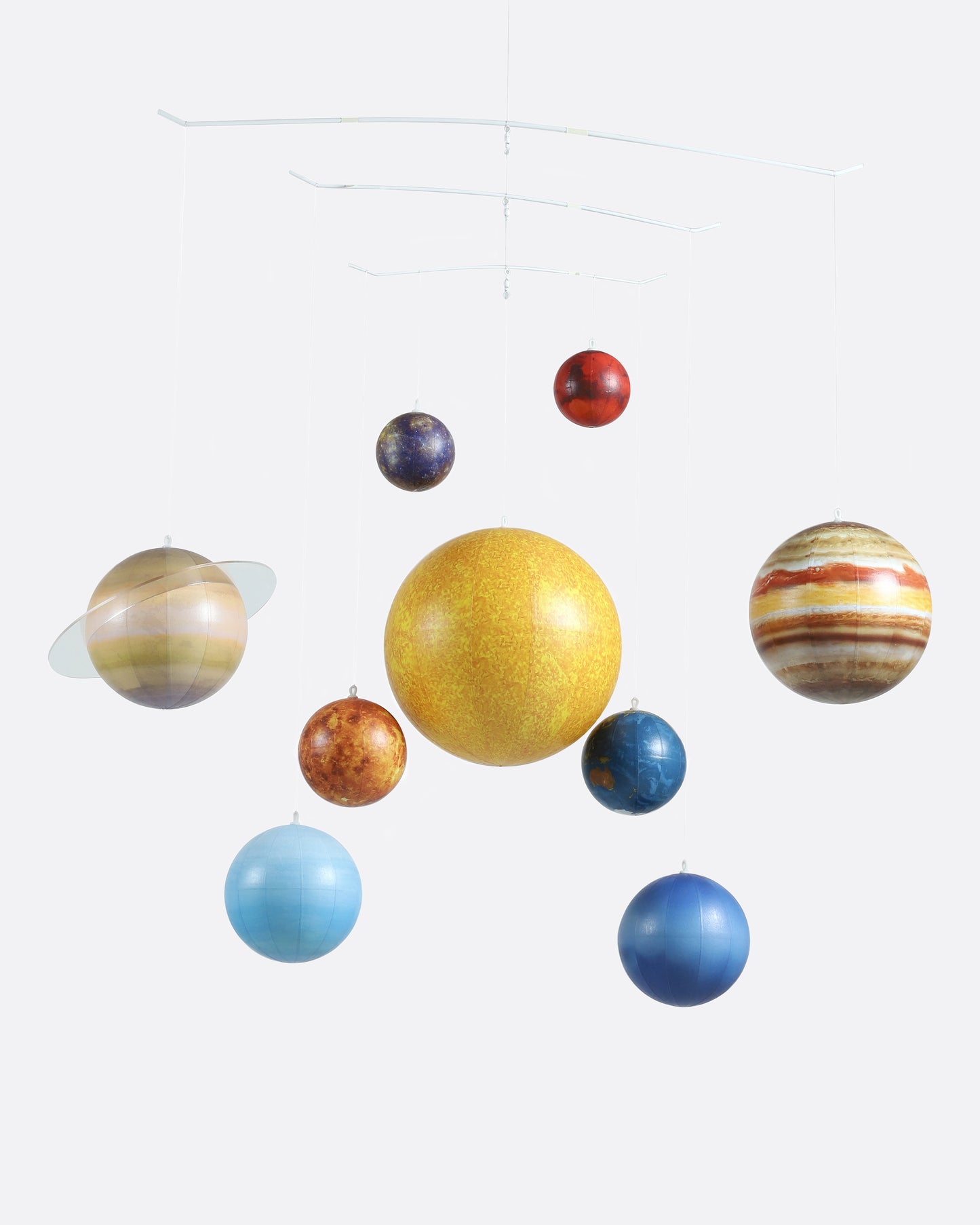 A hanging mobile with each of the planets and the sun in our solar system.