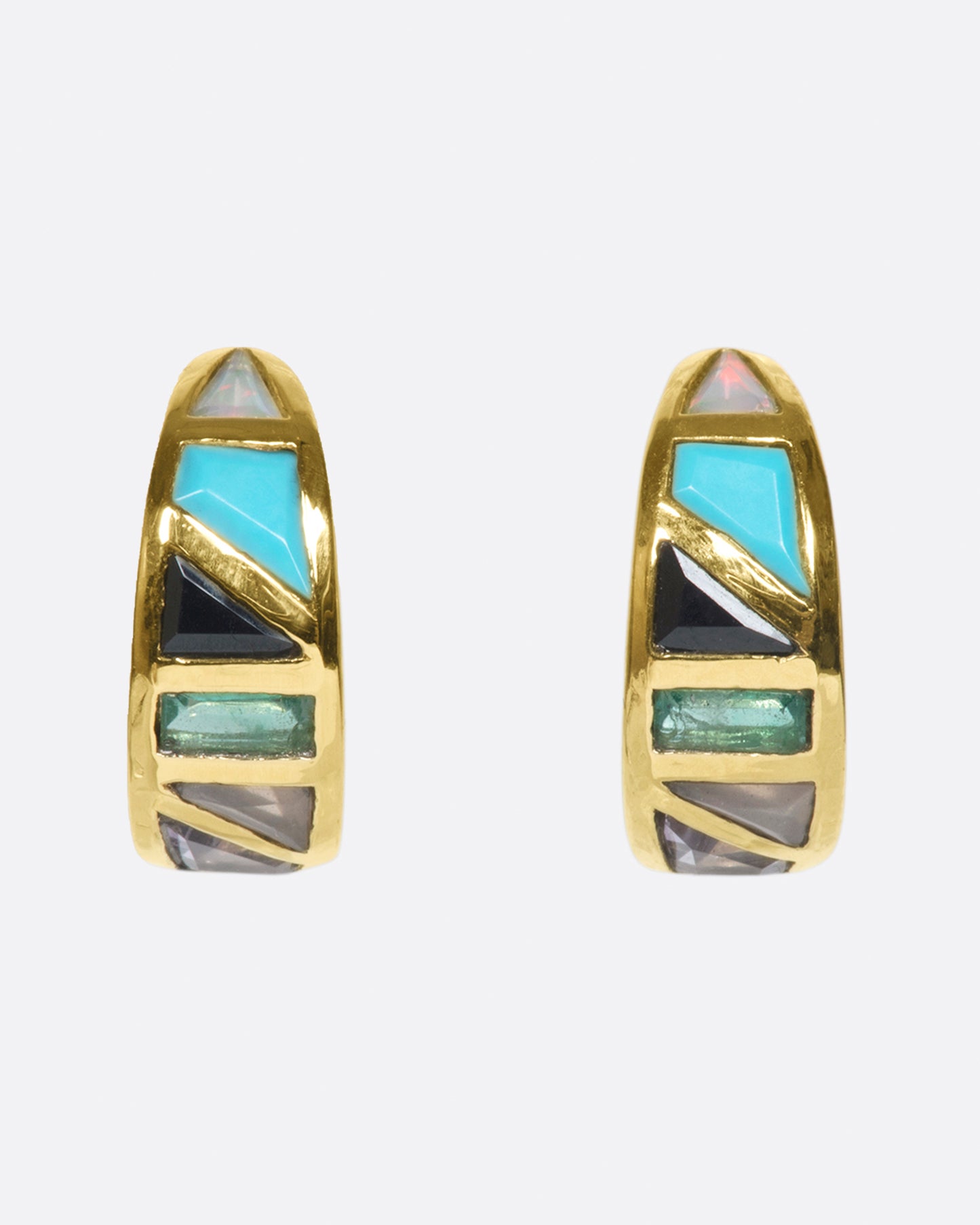 A special pair of mosaic huggies with a cool color palette of hand-cut stones intricately set in 9k gold