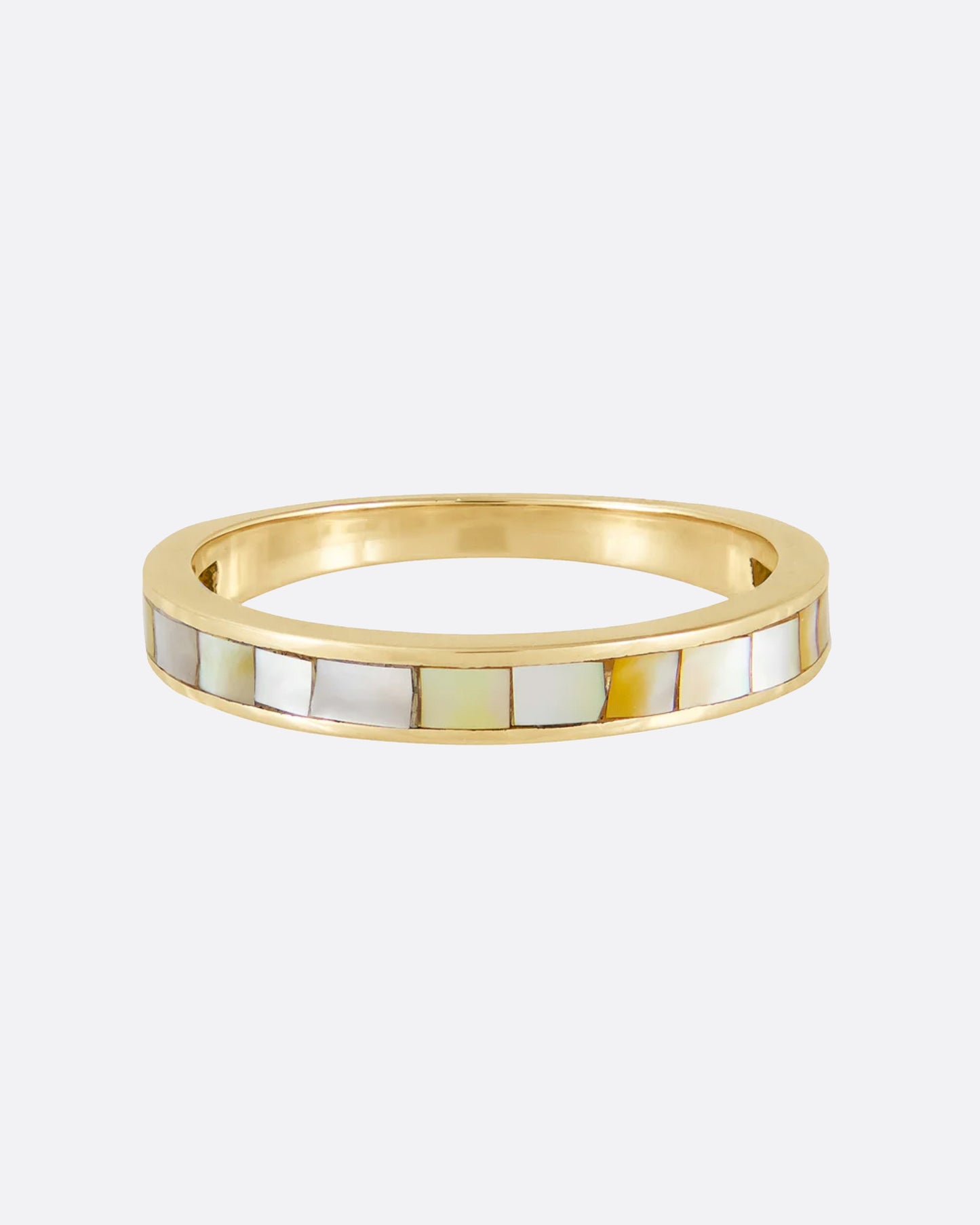 This ring looks like it's lined with a mosaic of iridescent tiles.