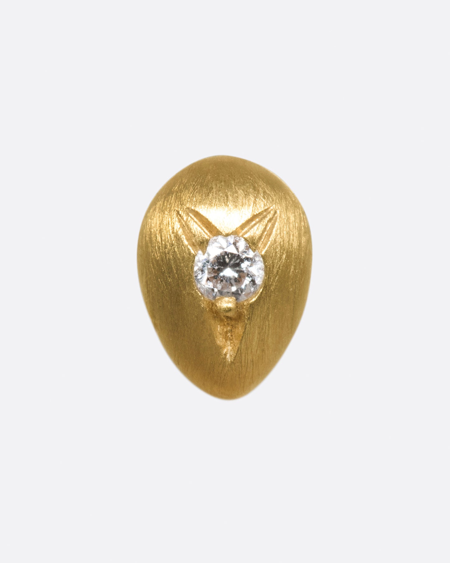 This brushed gold earring is smooth and rounded like a real drop of water.
