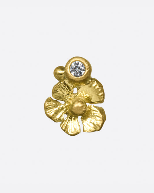 This five-petaled flower has an added bezel set diamond for a bit of sparkle.