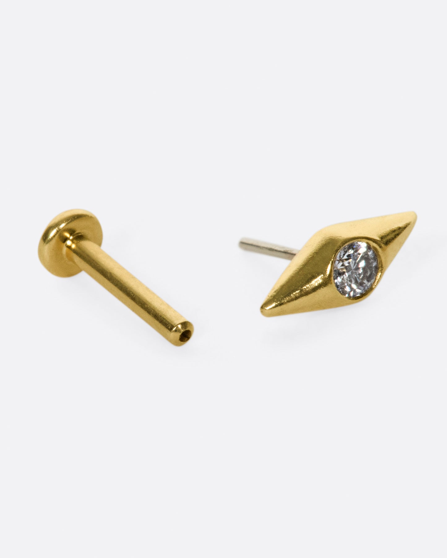 This earring gives you a little bit of everything; points, curves, sparkle, shine.