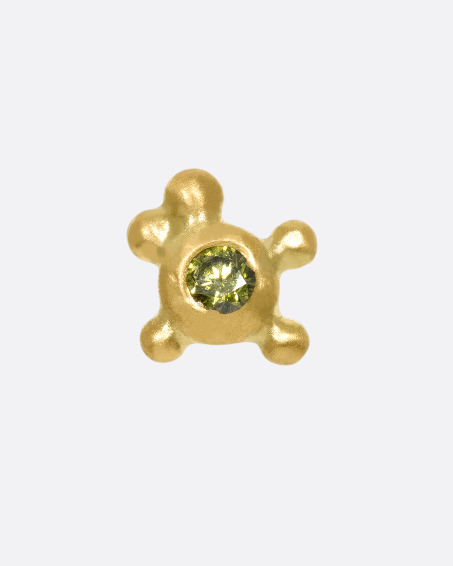 No two of these cluster studs is exactly the same; this time with four granules and an olive green diamond.