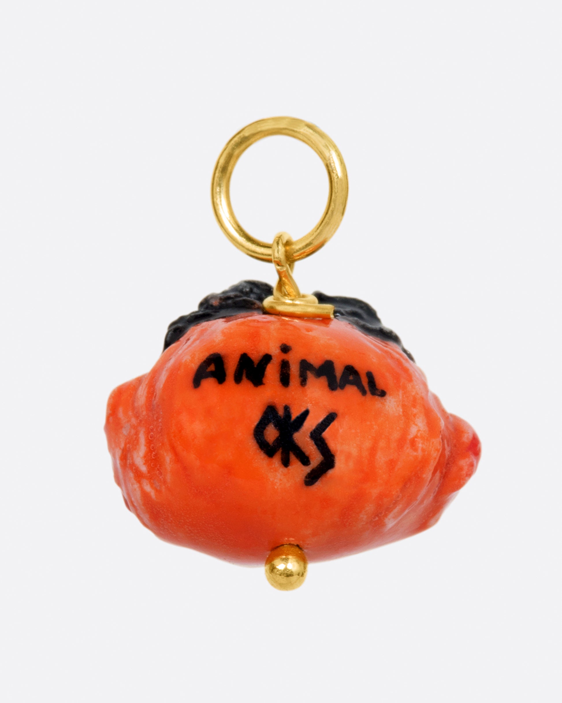 A handmade 3D porcelain Animal muppet charm with a yellow gold bail.