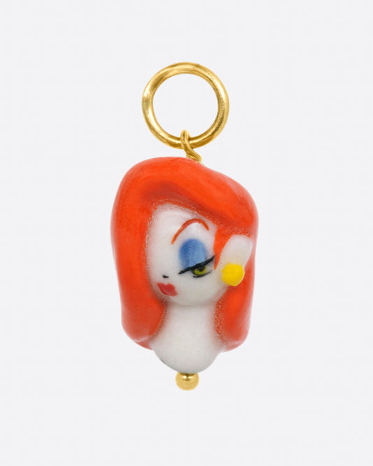 A handmade porcelain charm in the 3D shape of Jessica Rabbit with a yellow gold bail.