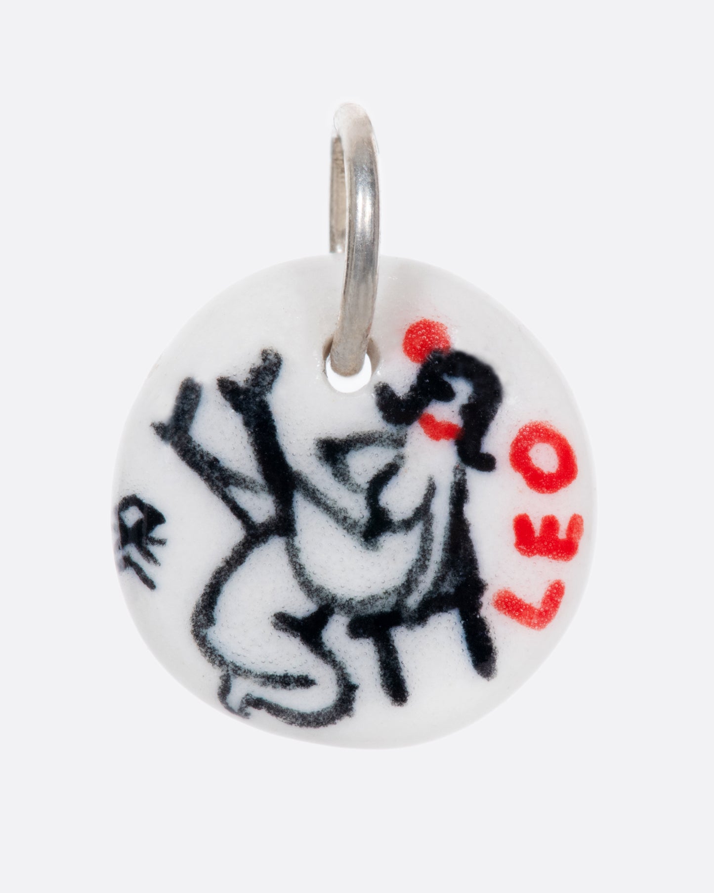 A handmade and painted porcelain zodiac disc charm with a sterling silver bail, featuring a sex position specific to each zodiac.