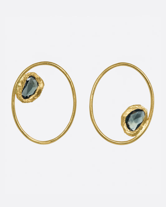 Almost giving the illusion of a hoop, these earrings are large and make a statement, but aren't too heavy.