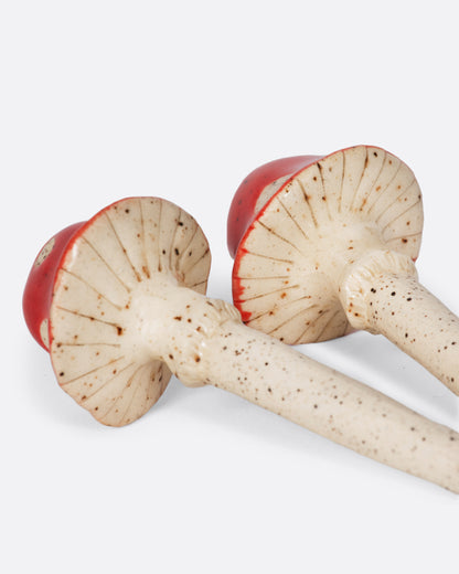 Ceramic mushroom plant stakes, close view of the caps from below
