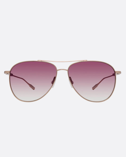 A pair of aviator sunglasses with pink gradient lenses. Shown from the front.