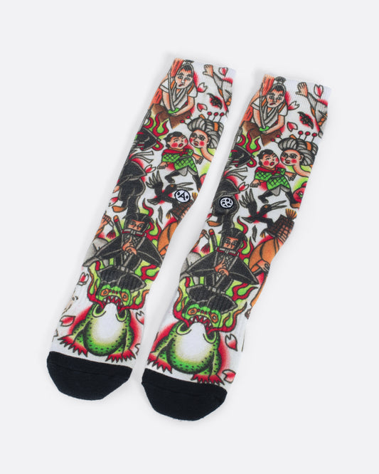 Socks with traditional Japanese style scene of people, ninjas and frogs. View from the front.