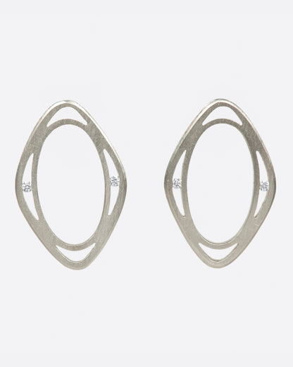 Vintage white gold diamond window stud earrings, the pair from the front
