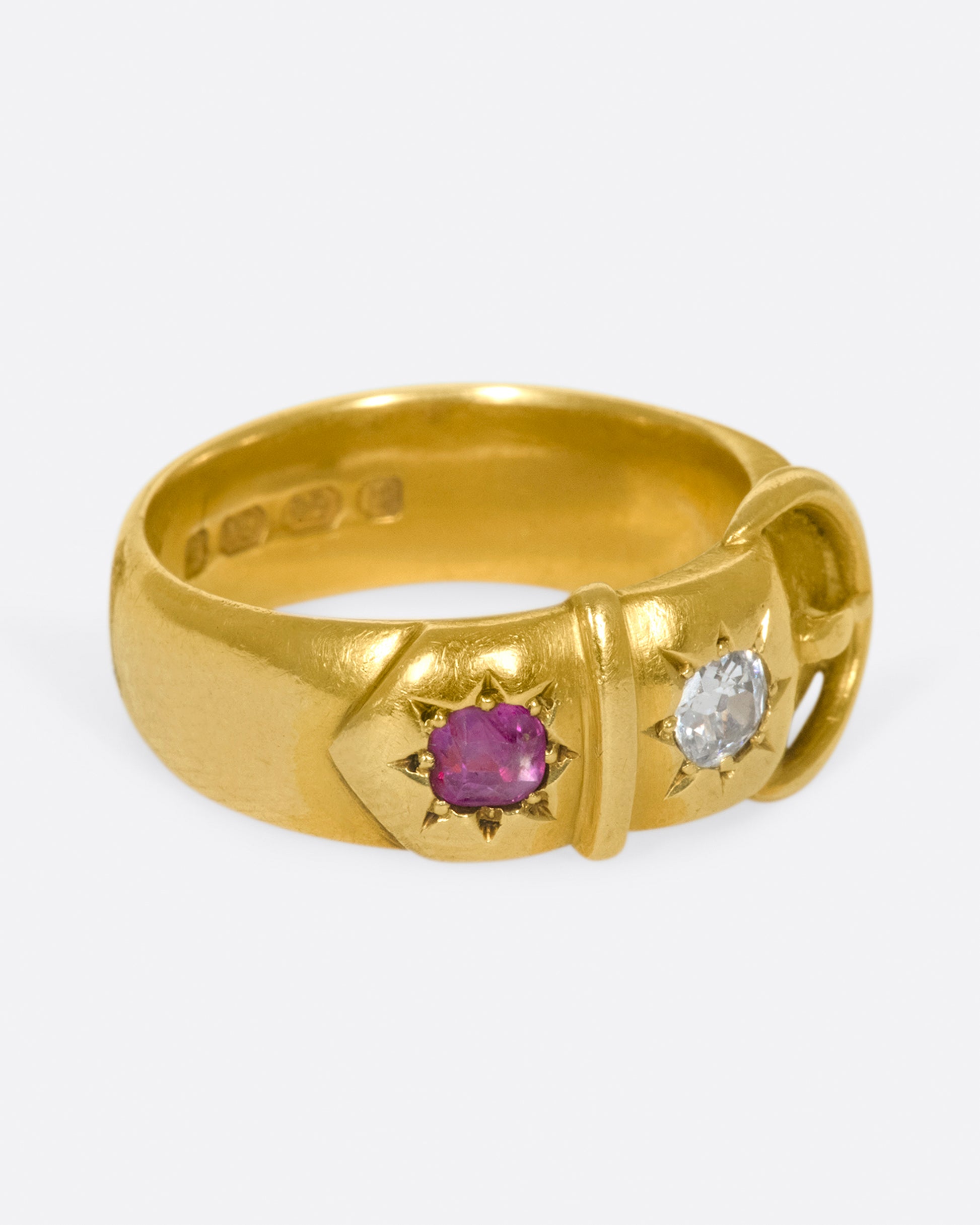 Dating back 1891 in Birmingham, England, this buckle ring is buttery soft with vibrant stones.
