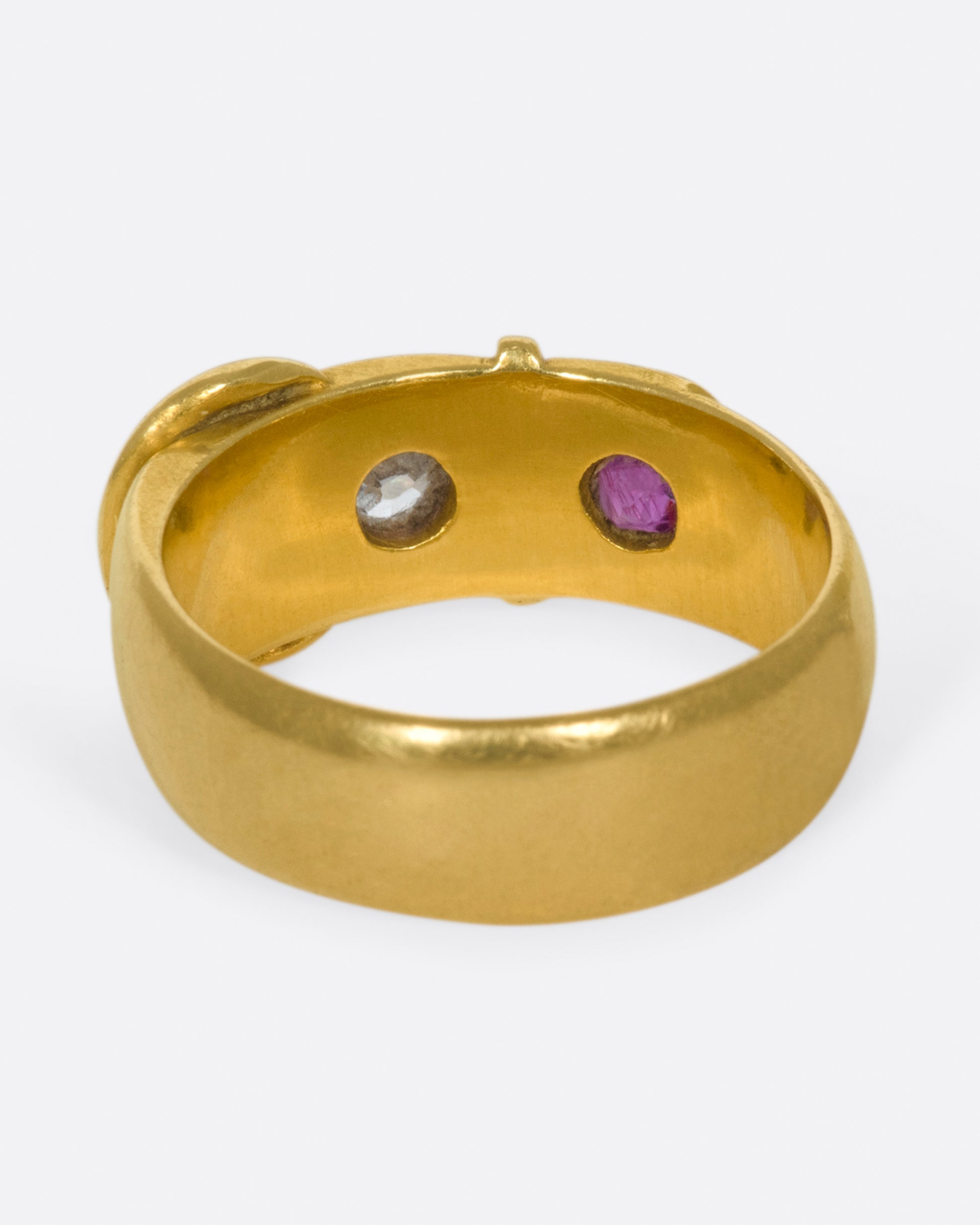 Dating back 1891 in Birmingham, England, this buckle ring is buttery soft with vibrant stones.