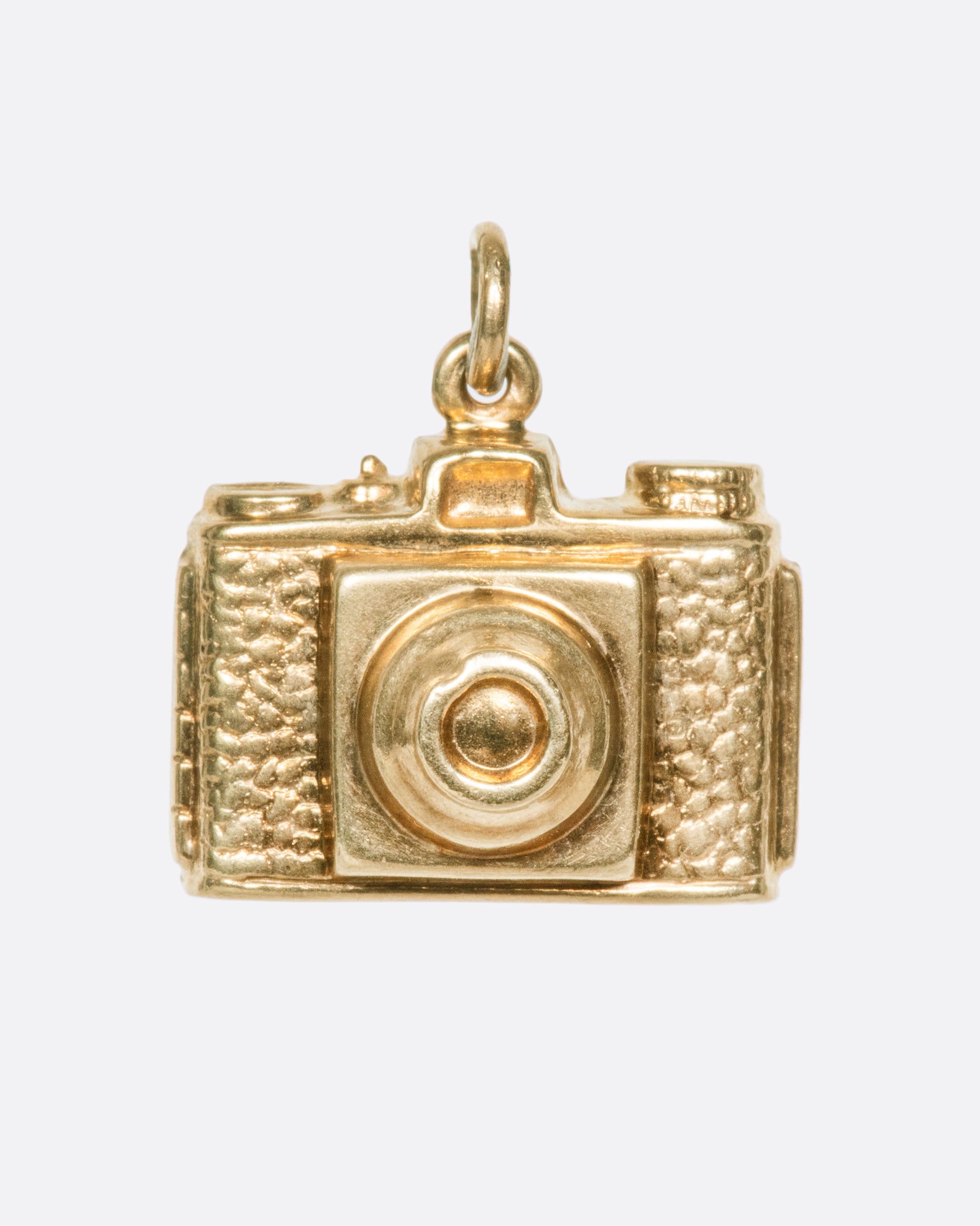 A highly detailed manual camera charm for someone passionate about photography.