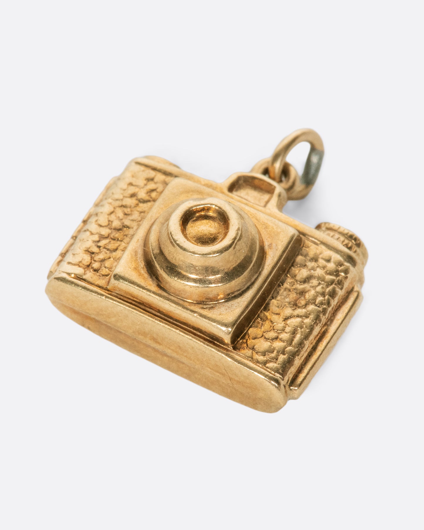 A highly detailed manual camera charm for someone passionate about photography.