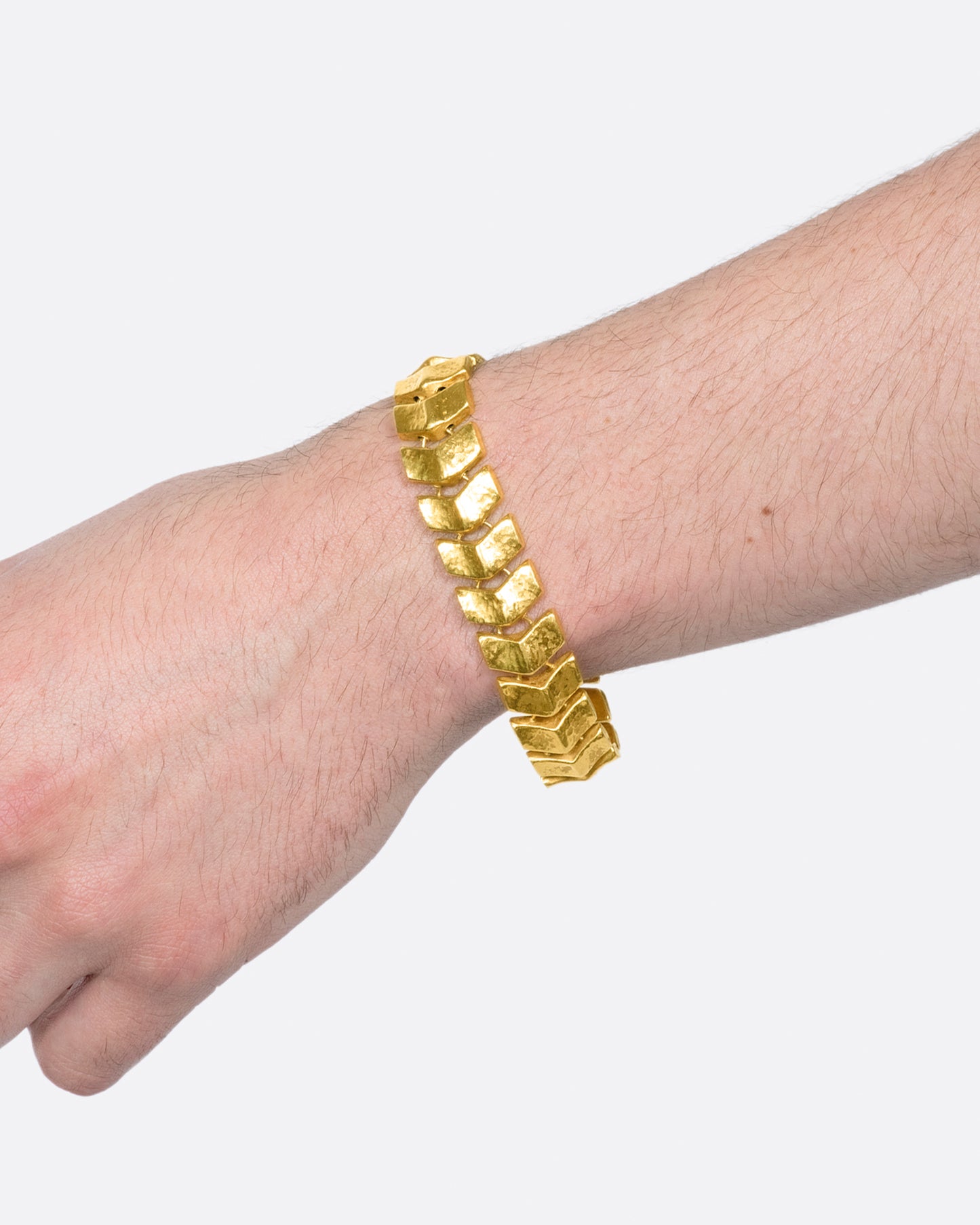 Made from buttery, high karat gold, the links on this bracelet are both substantial in size and in impact.