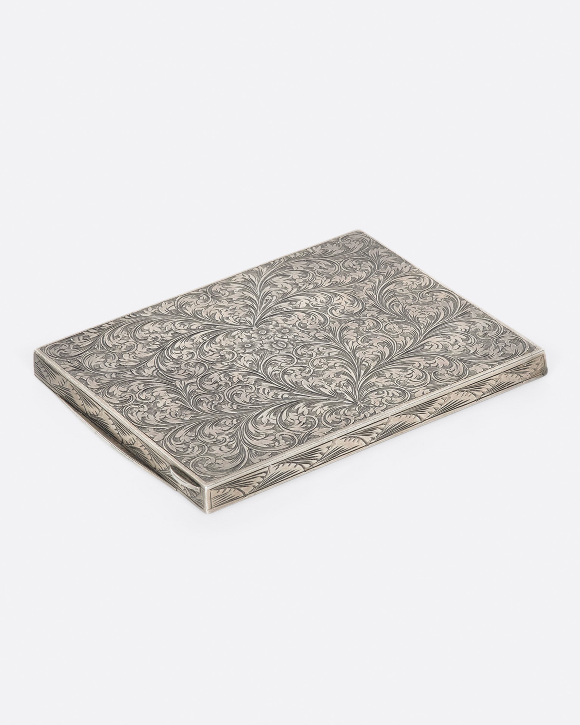 This slim, floral box is perfect for stashing joints, cigarettes, credit cards; you name it.