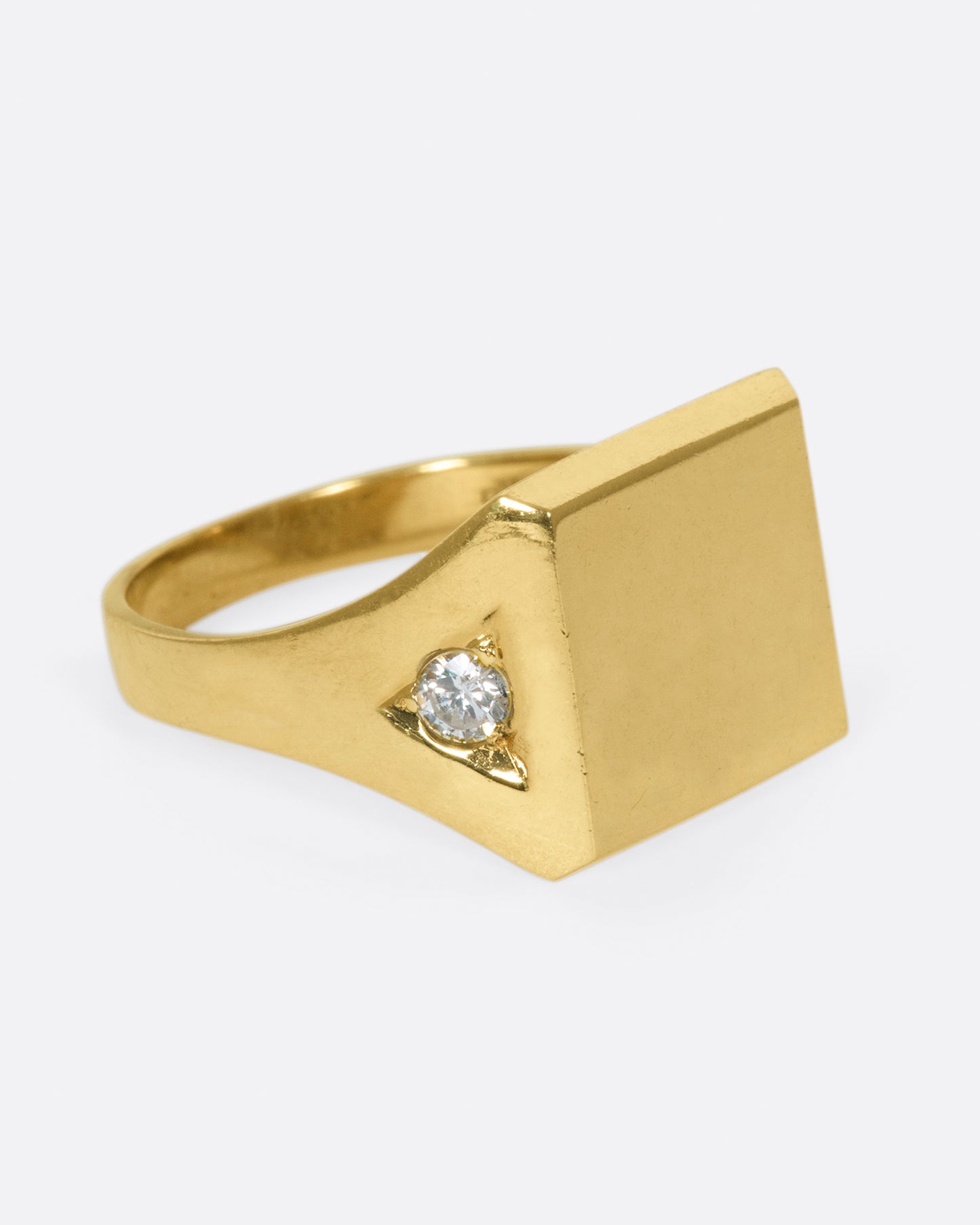 This blank signet is just as cool as is, with its diamond accents, as it would be with your or a loved one's initials.