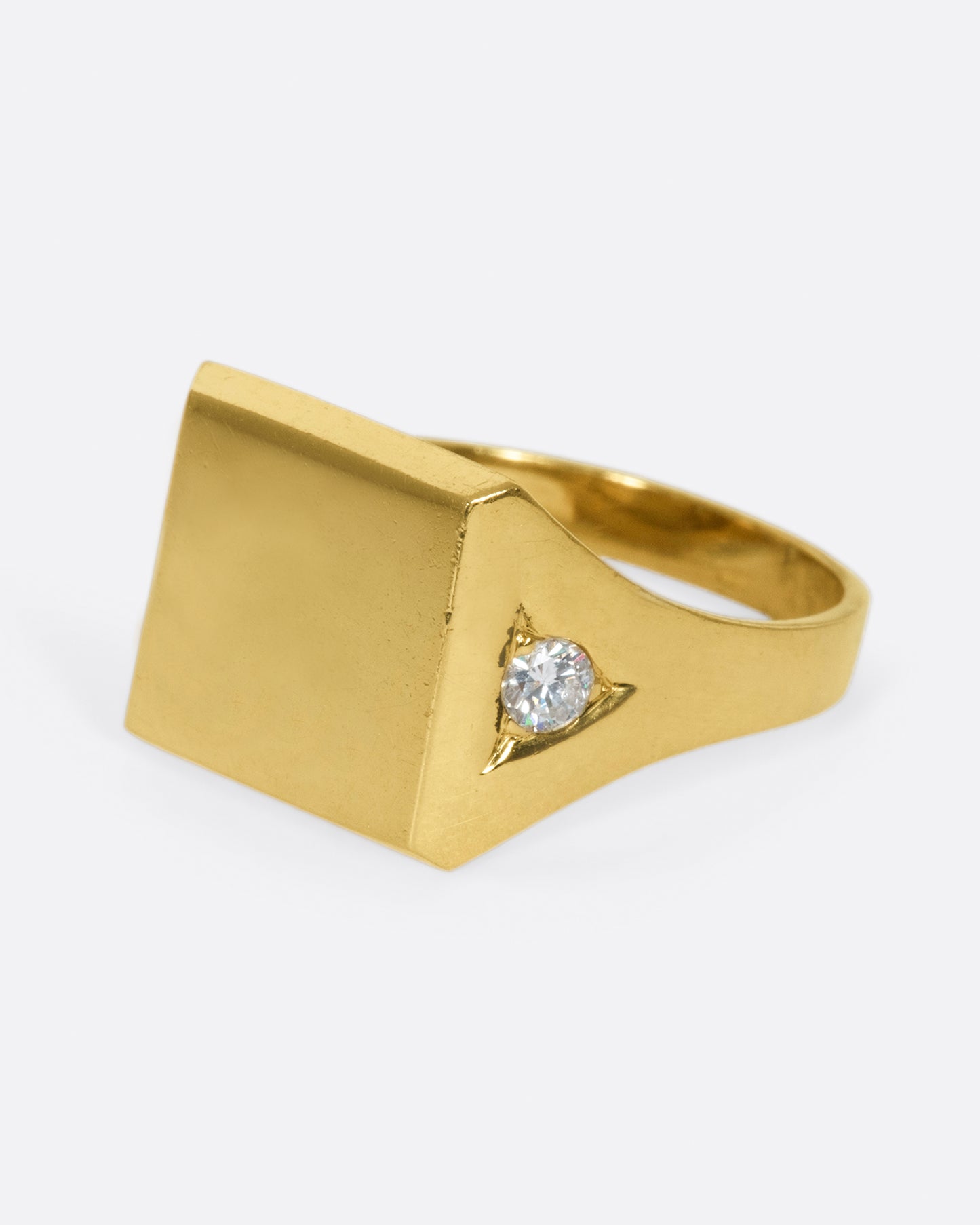 This blank signet is just as cool as is, with its diamond accents, as it would be with your or a loved one's initials.