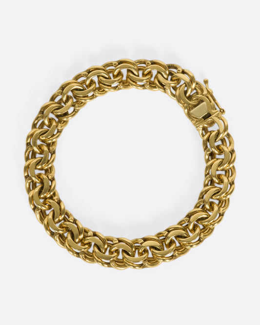 A heavy, woven chain bracelet that you won't want to take off.