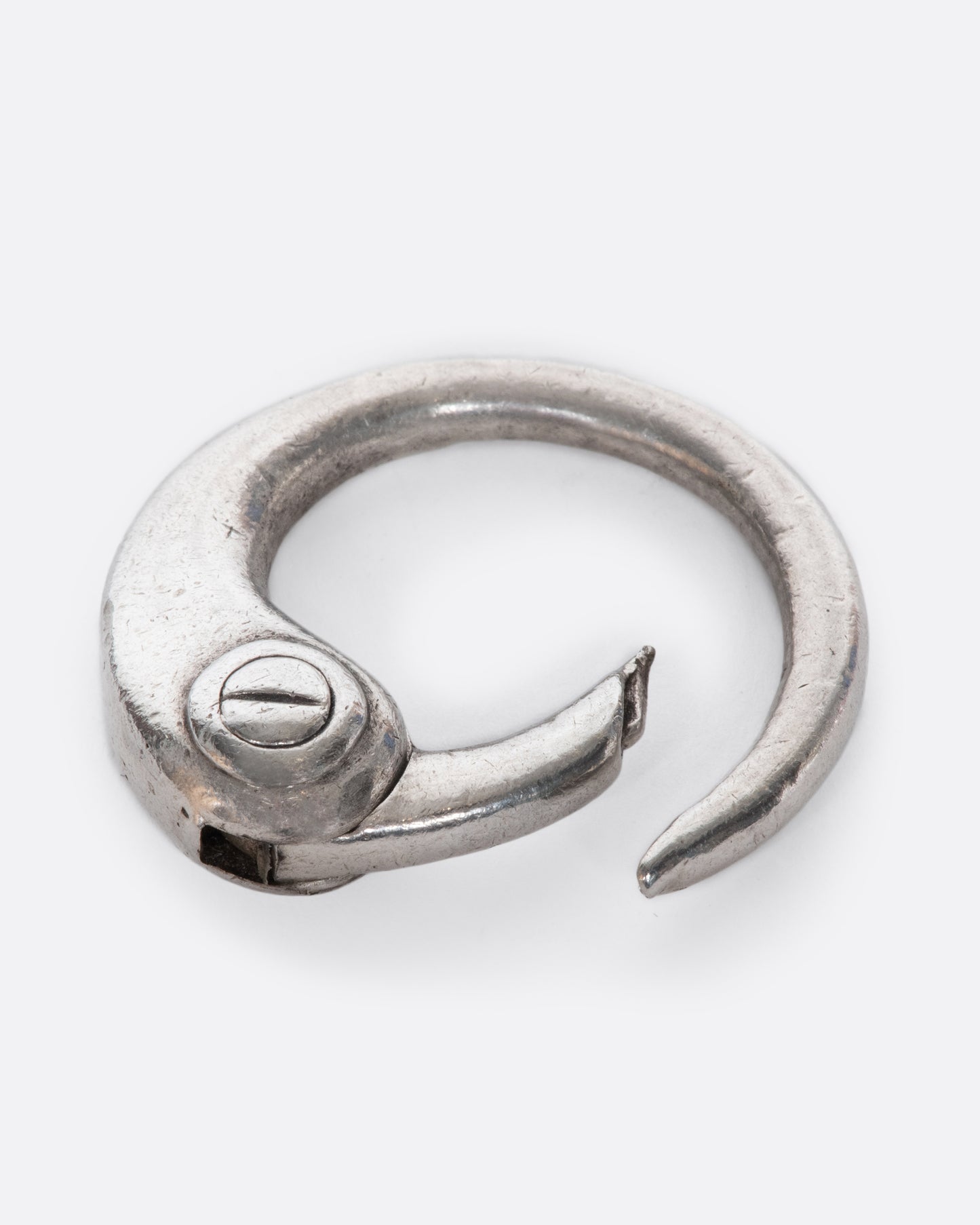 You'll be hard-pressed to find a more chic place for your keys than this vintage flamingo key ring. Just press in its beak to lock in or release your keys.