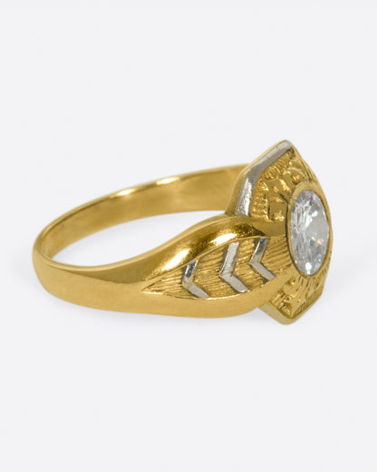 Vintage gold and platinum diamond ring, side view with the diamond facing right