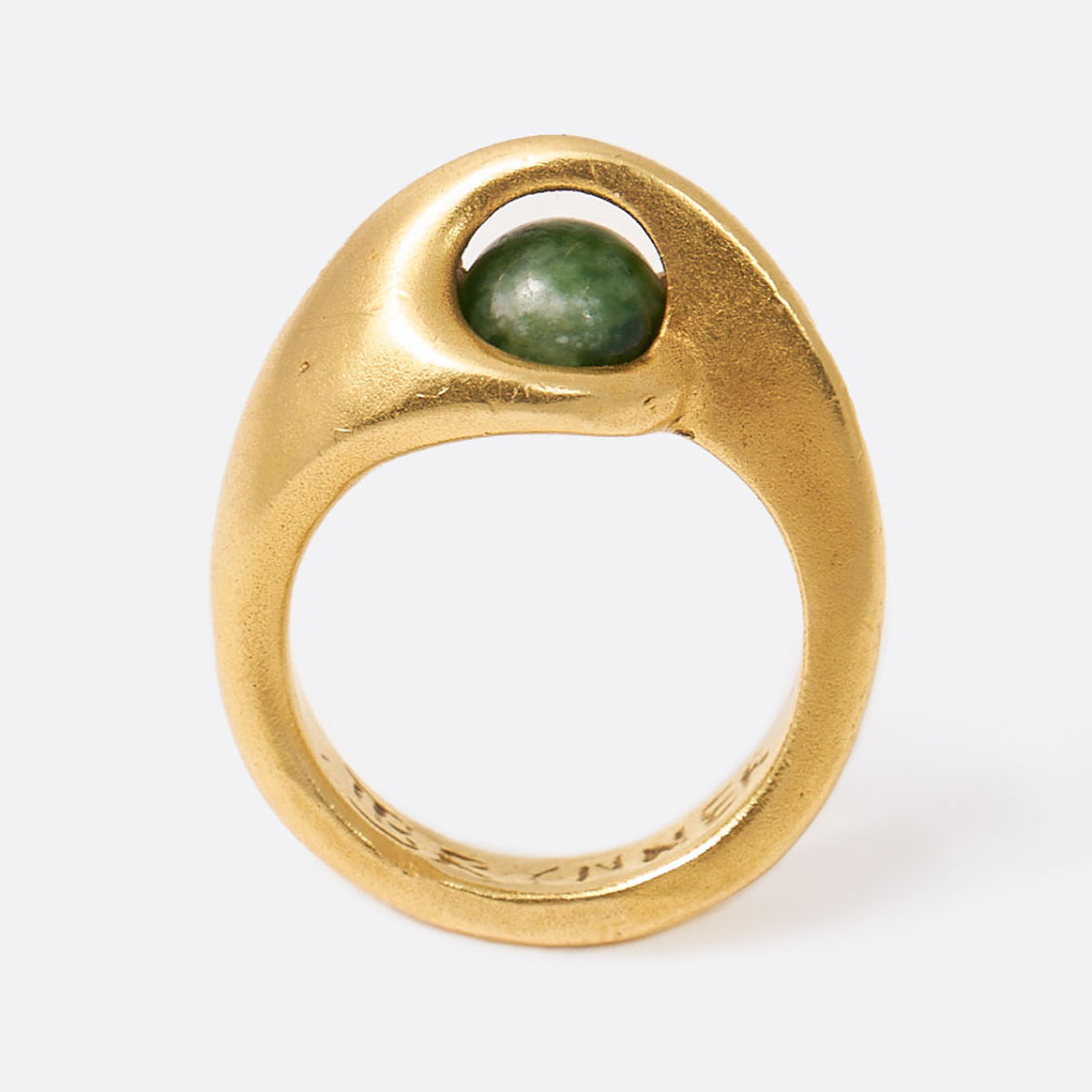 Yellow gold ring with floating green sodalite sphere, shown from the side.
