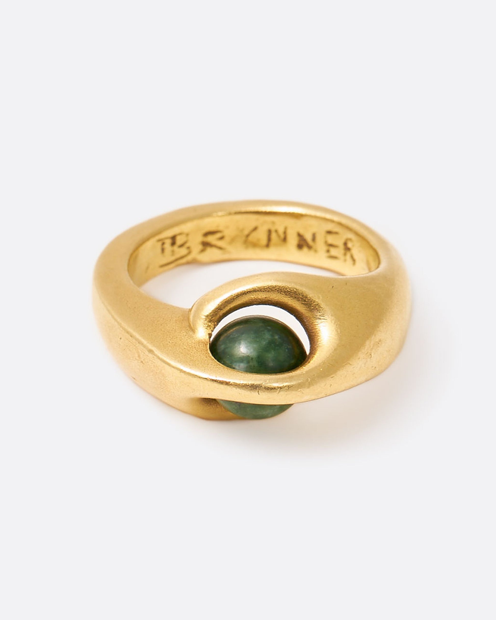 Yellow gold ring with floating green sodalite sphere, shown from the front.